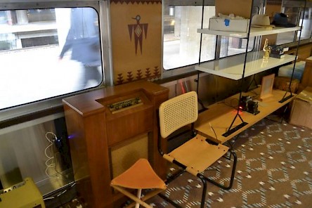 Vintage radio and camera (on bottom shelf at right).